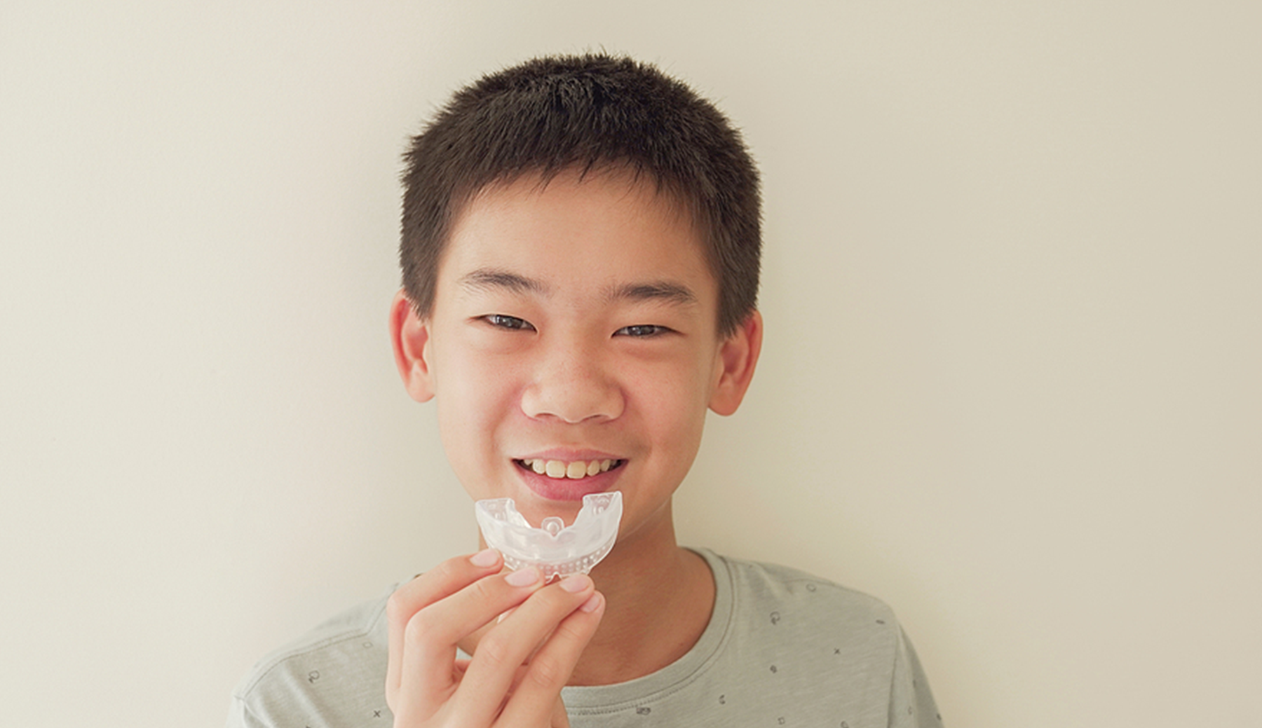 Child athlete with mouthguard