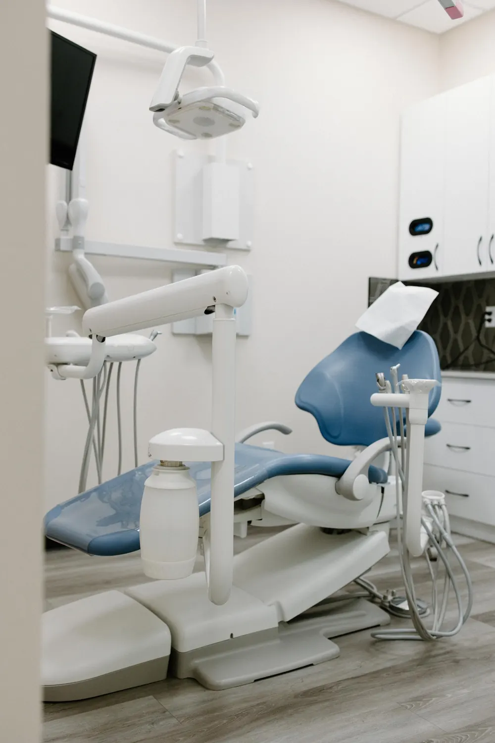 Treatment room with a blue dental chair at Smiles @ Southgate