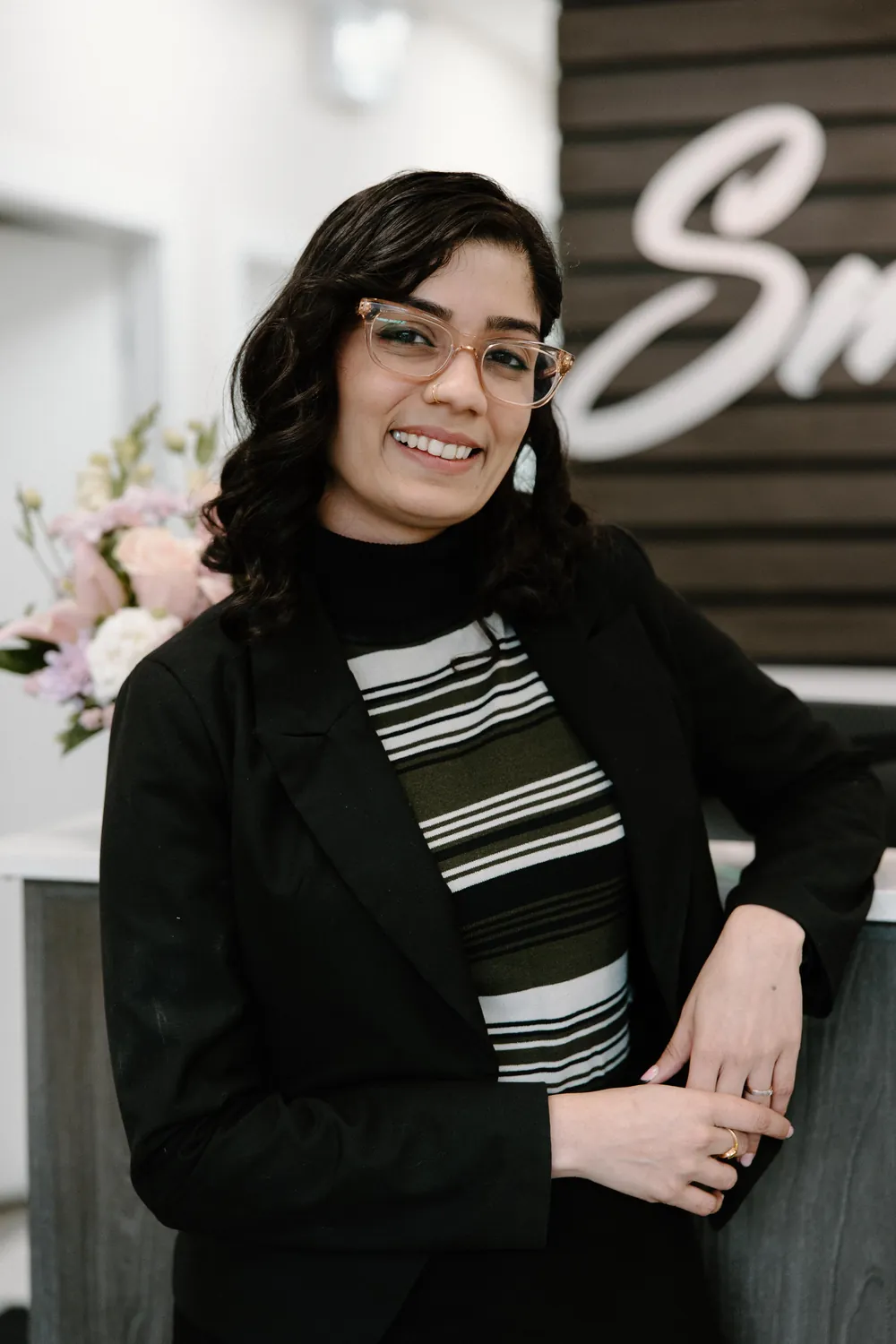 Smiles @ Southgate front desk team member at reception